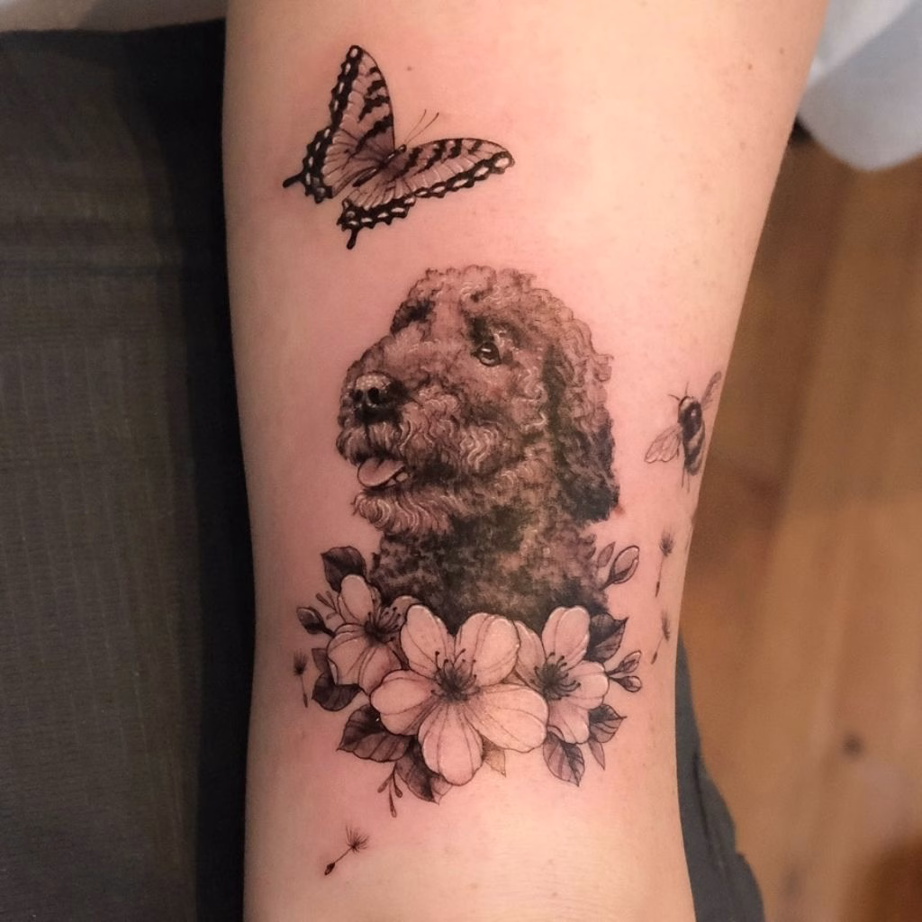 94+ Labrador Tattoo Designs for Men and Women with Meaning 64 Labrador with a Butterfly Tattoo Idea